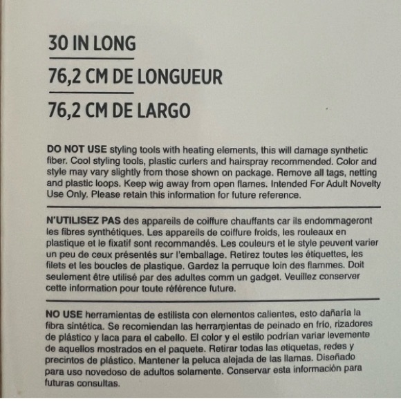 Long platinum blonde synthetic wig. Wore only once- in good condition. - Picture 2 of 2